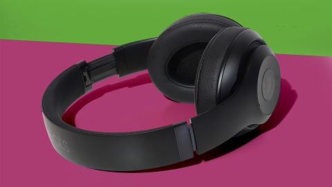 Bose Studio 3 Wireless headphones on colorful surface