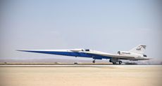 An illustration of the X-59 supersonic plane landing on a runway.