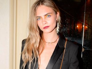 Cara Delevingne wears a jumpsuit on the red carpet