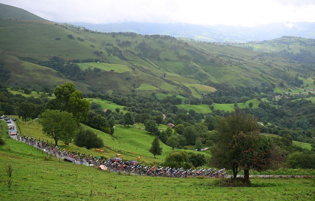 SANTANDER SPAIN SEPTEMBER 04 A general view of the peloton climbing to the Alto de la Estranguada 681m during the La Vuelta 79th Tour of Spain 2024 Stage 17 a 1415km stage Arnuero to Santander UCIWT on September 04 2024 in Santander Spain Photo by Dario BelingheriGetty Images