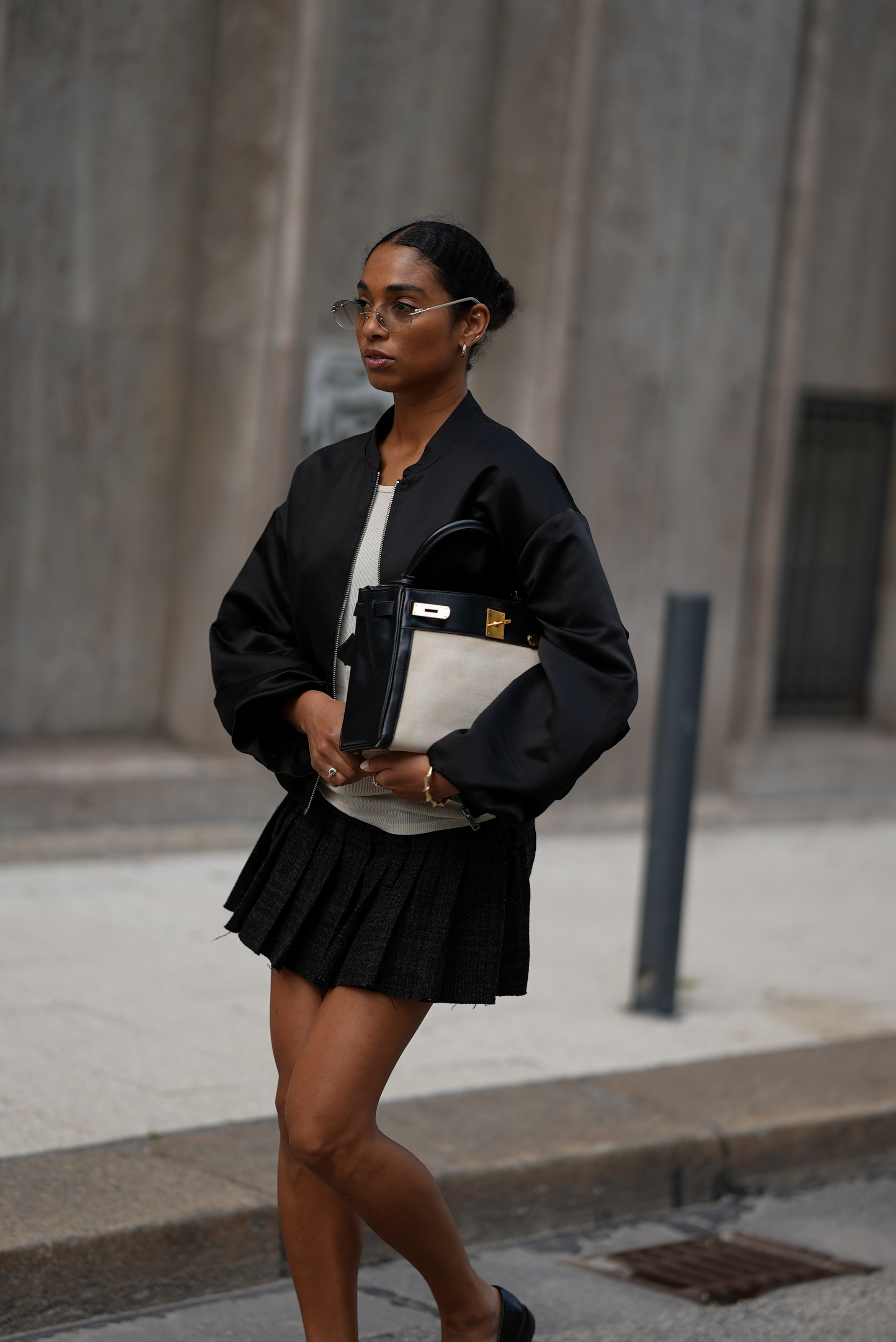 woman wearingn a mini skirt and a jacket