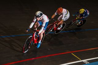 Fred Wright riding in a velodrome