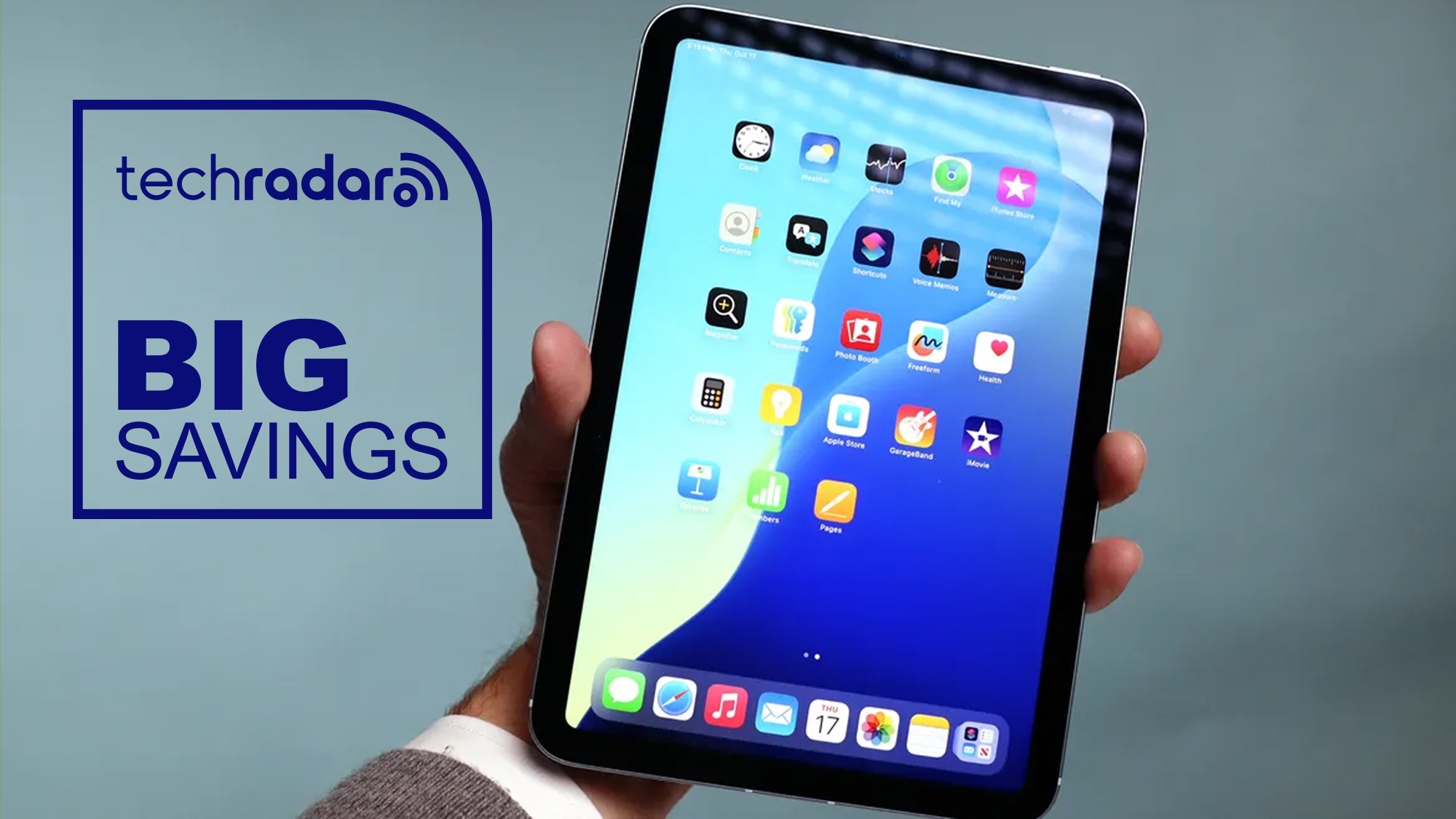 iPad mini being held with a &#039;big savings&#039; badge 