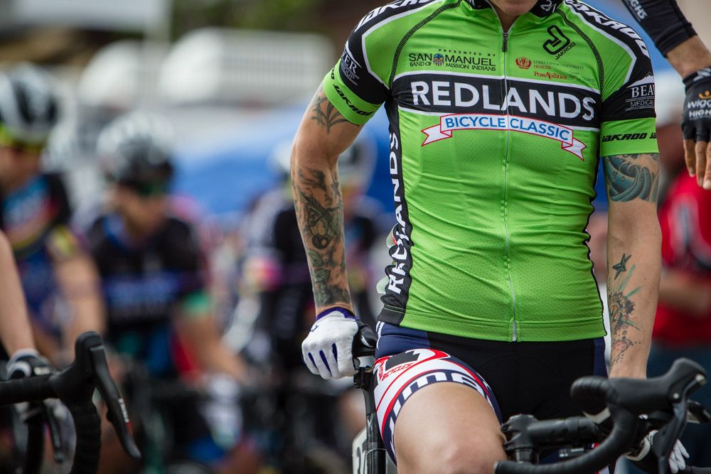 The green sprint jersey on the start line of Starla Teddergreen