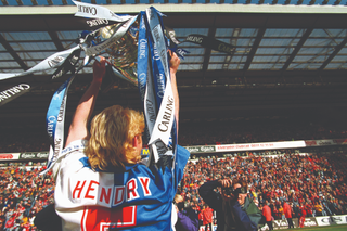 Colin Hendry lifts Premier League with Blackburn Rovers, 1995