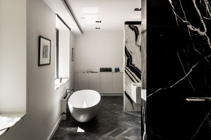 a black and white marble bathroom