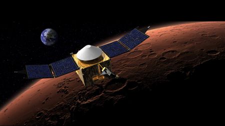 This artist's concept shows NASA's MAVEN spacecraft in orbit around Mars, with a fanciful image of her home planet in the background. 