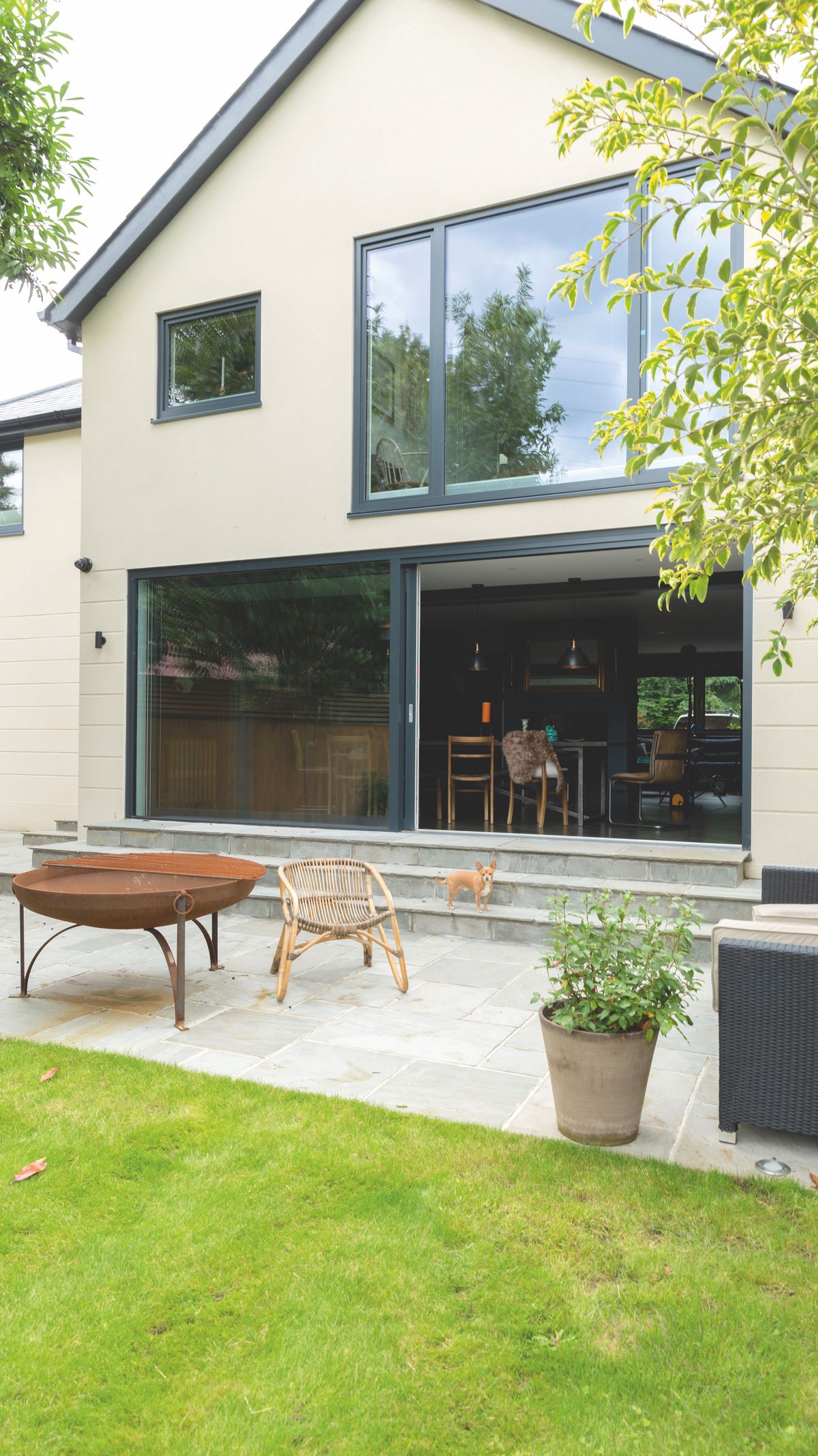 A two-storey rear extension, with Juliet balcony, a single-storey side extension and first floor front extension including three side facing rooflights have transformed the house.