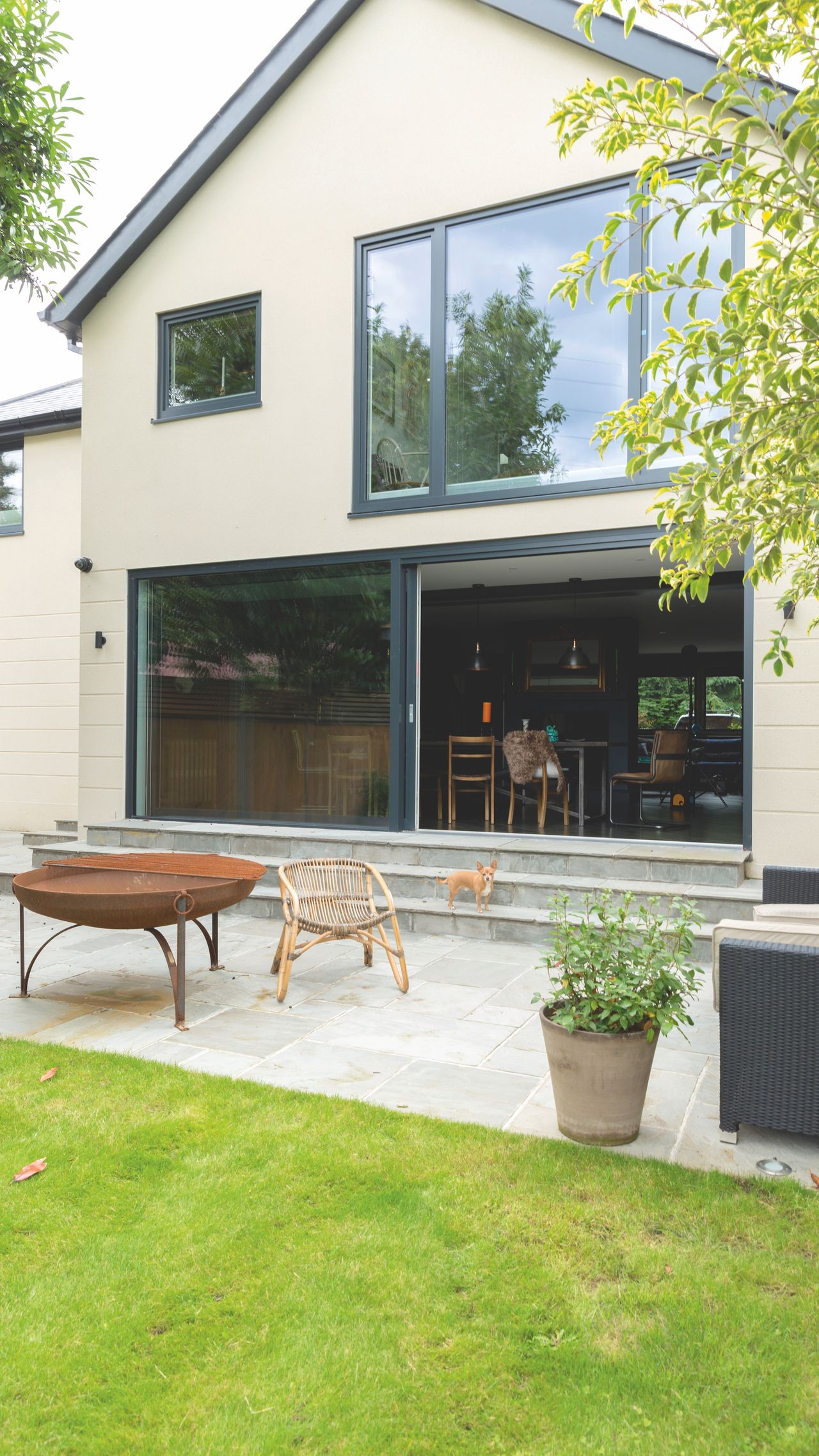 A two-storey rear extension, with Juliet balcony, a single-storey side extension and first floor front extension including three side facing rooflights have transformed the house.