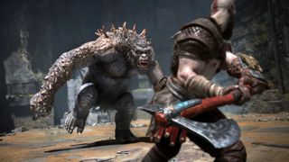 En skärmdump från God of War, där Kratos slåss mot ett trolliknande monster.