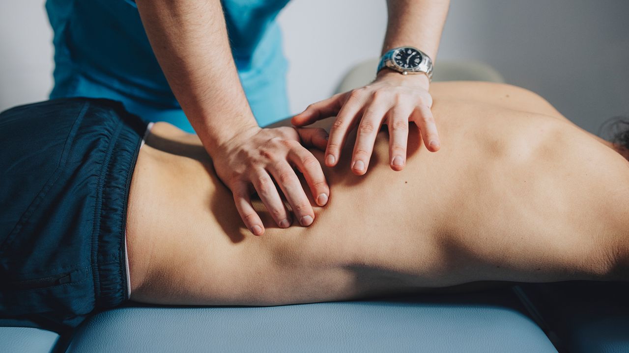 man getting a back massage