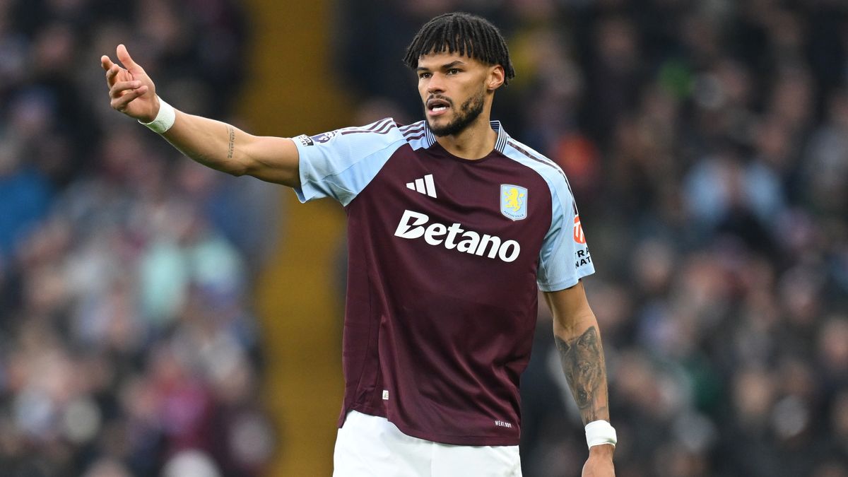 Tyrone Mings of Aston Villa remonstrates with one arm during a Premier League match