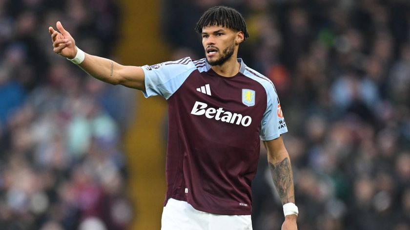 Tyrone Mings of Aston Villa remonstrates with one arm during a Premier League match