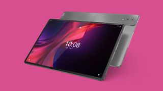 Lenovo Tab Extreme against a dark pink background