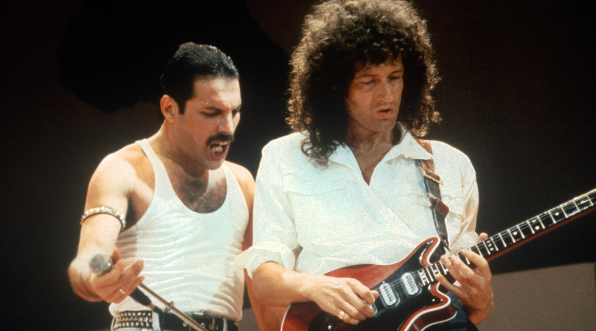 Freddie Mercury and Brian May of the band Queen at Live Aid on July 13, 1985 in London, United Kingdom.