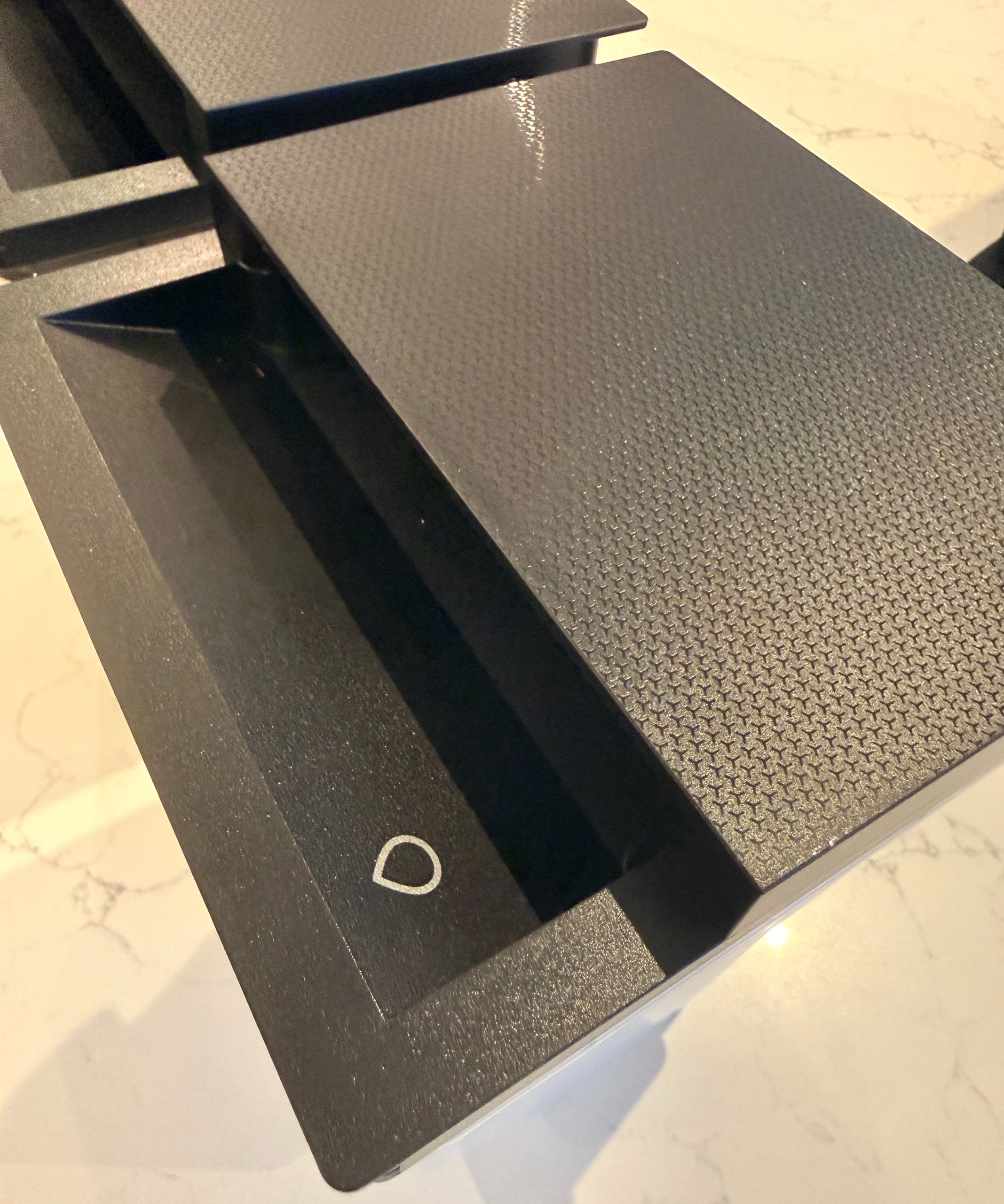 Close-up of recessed handle on ECOVACS DEEBOT X11 OmniCyclone water tank
