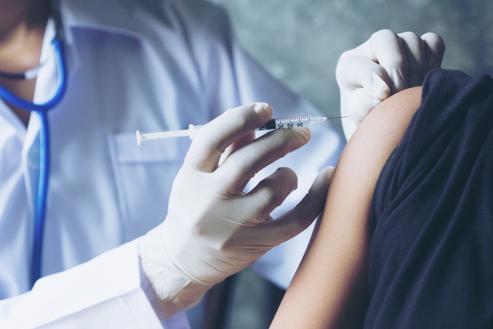 Should researchers deliberately infect volunteers with coronavirus to test vaccines?
