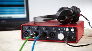 A Focusrite Scarlett 18i8 audio interface and Sennheiser headphones, taken on November 26, 2013.