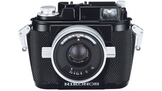 A Nikon Nikonos (1963) on a white background