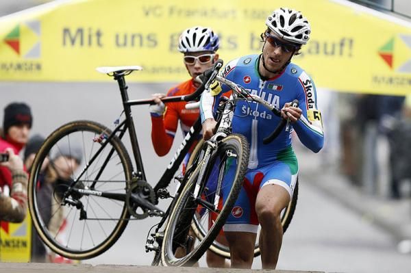 Elia Silvestri (Italy) leads Lars Van Der Haar (Netherlands) over the barriers.