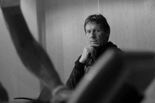 Former Paris-Roubaix winner Dirk Demol watches on
