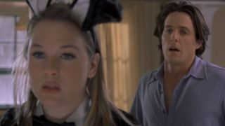 Bridget looking surprised with Daniel behind her in Bridget Jones's Diary