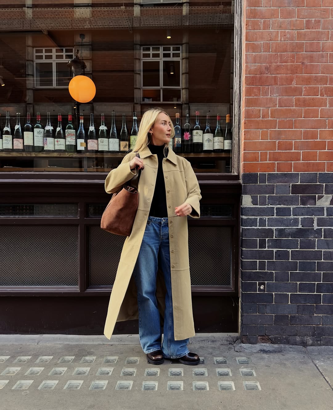 @chloekathbutler wears jeans and coat