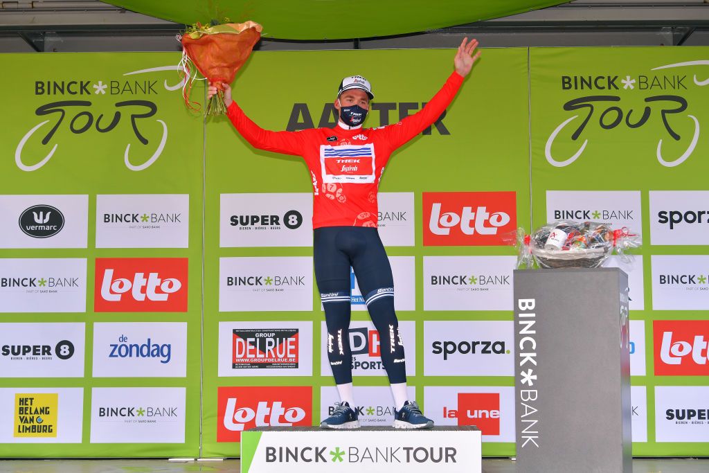 AALTER BELGIUM OCTOBER 01 Podium Mads Pedersen of Denmark and Team Trek Segafredo Red Points Jersey Celebration Mask Covid safety measures Flowers during the 16th BinckBank Tour 2020 Stage 3 a 157km stage from Aalter to Aalter BinckBankTour BinckBankTour on October 01 2020 in Aalter Belgium Photo by Luc ClaessenGetty Images