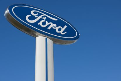 Ford dealership sign.