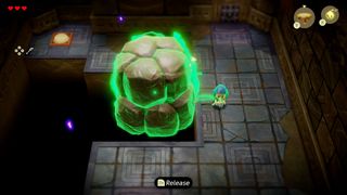 The player picks up a large rock using the Bind ability in The Legend of Zelda Echoes of Wisdom.