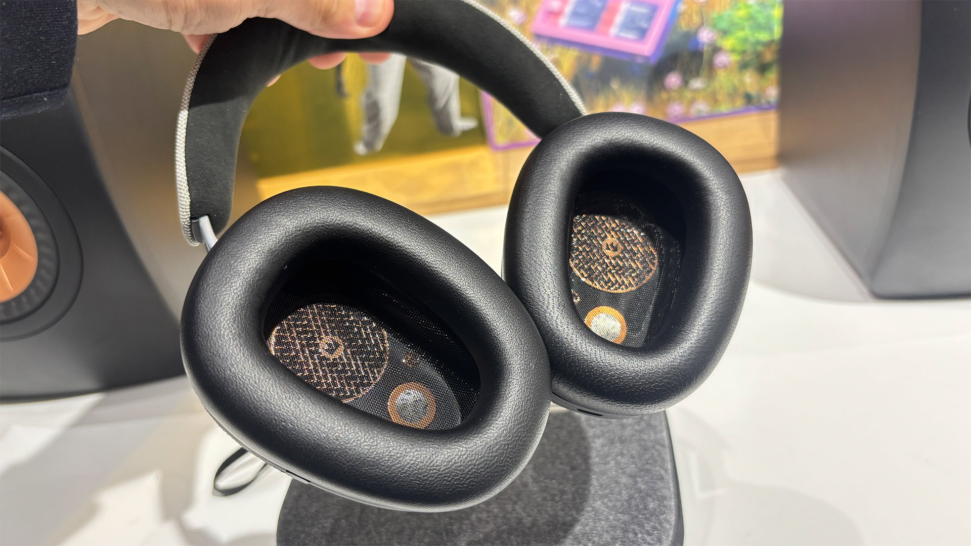 Noble Fokus Artemis over-ear headphones held in hand showing inside of earcups