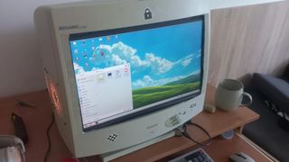 PC build in an old CRT monitor, front view showing screen and Windows XP-like desktop