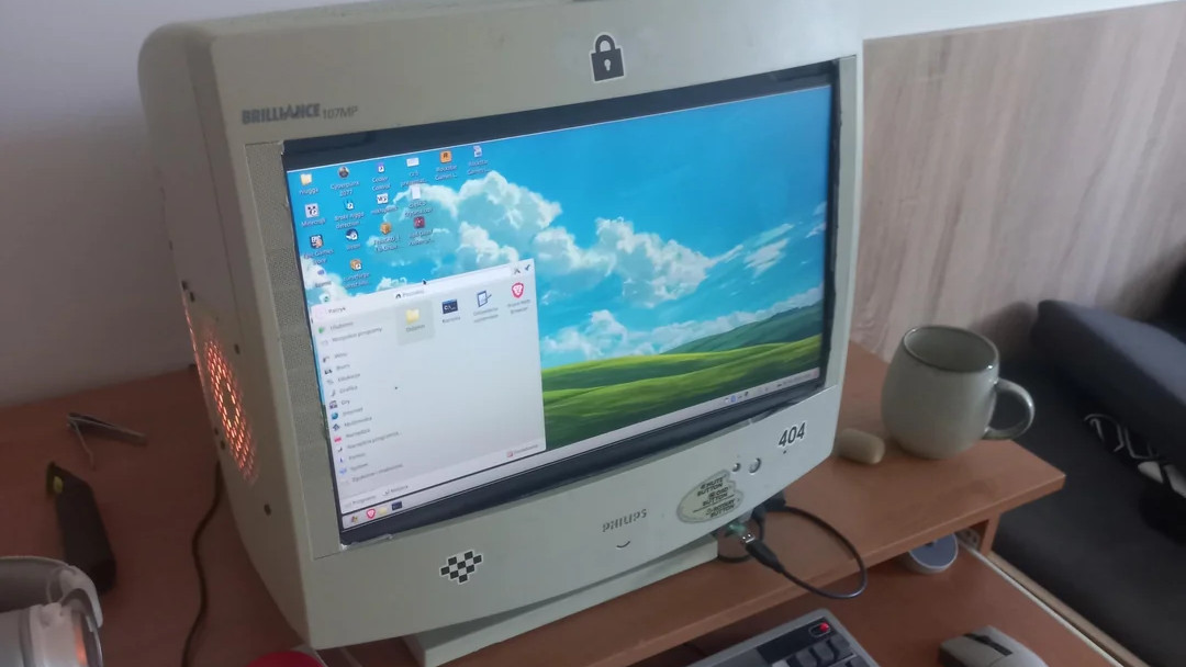 PC build in an old CRT monitor, front view showing screen and Windows XP-like desktop