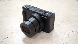 Sony ZV-1 II camera on a marble table angle front