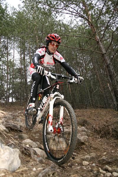 A rider in Romania pre-rides the Maros Bike XCO Cup course.