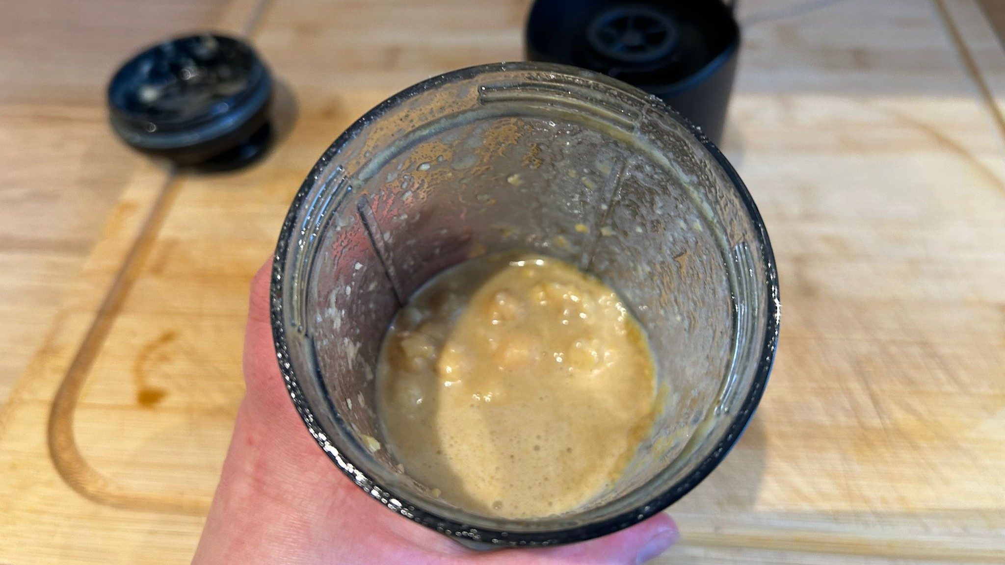 Nutribullet Flex blender containing blended hummus