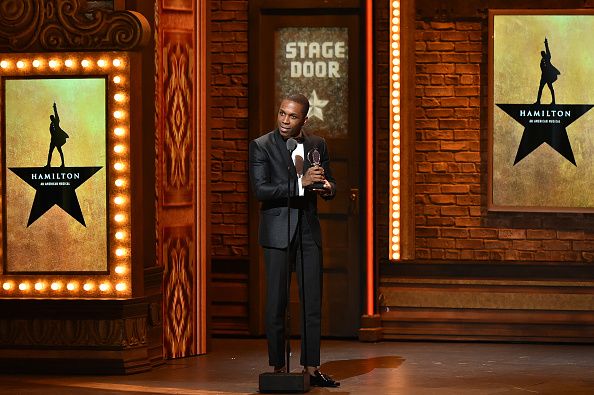 Leslie Odom Jr. accepts his Tony Award Sunday night.