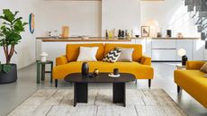  Mustard Velvet 3 Seater Sofa in a modern industrial style living room - Swyft