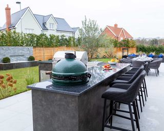 modern outdoor kitchen and dining area from Consilium Hortus