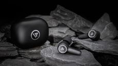 Lypertek PurePlay Z5 review: headphones placed on a rock