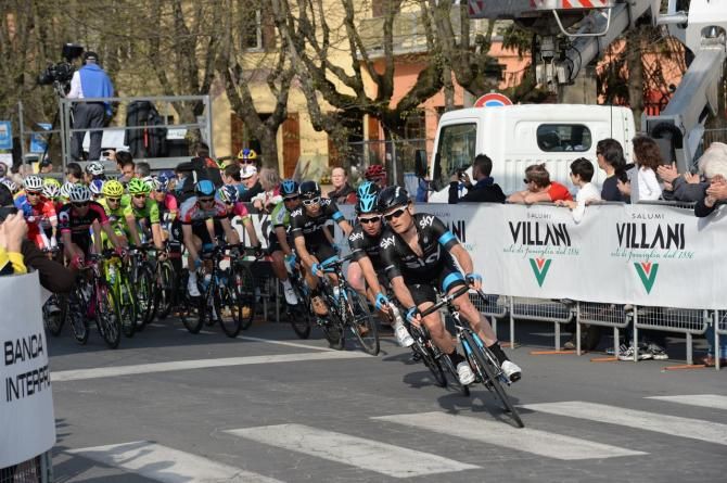 Team Sky lead the peloton on the last lap