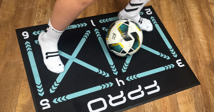FPRO Mat being used with football by a boy