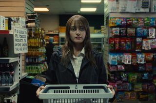 ella purnell as rhiannon while shopping at the grocery store in sweetpea