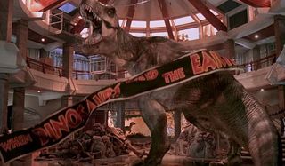 Jurassic Park Roberta the T-Rex roars in front of a falling banner