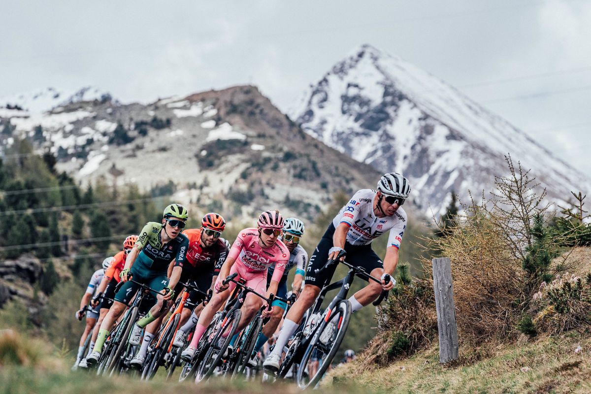 Maglia rosa Tadej Pogačar races through the Alps among the group of GC contenders on stage 15 of the Giro d&#039;Italia