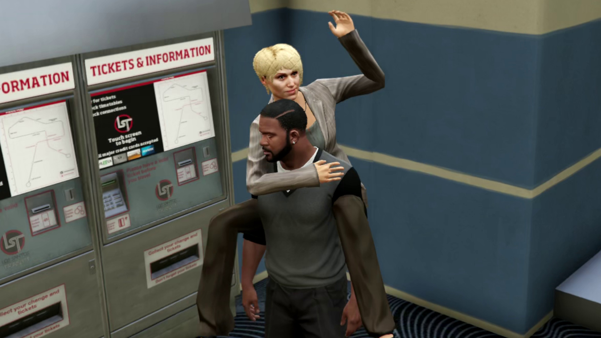 Giving a businesswoman a piggyback in departures.