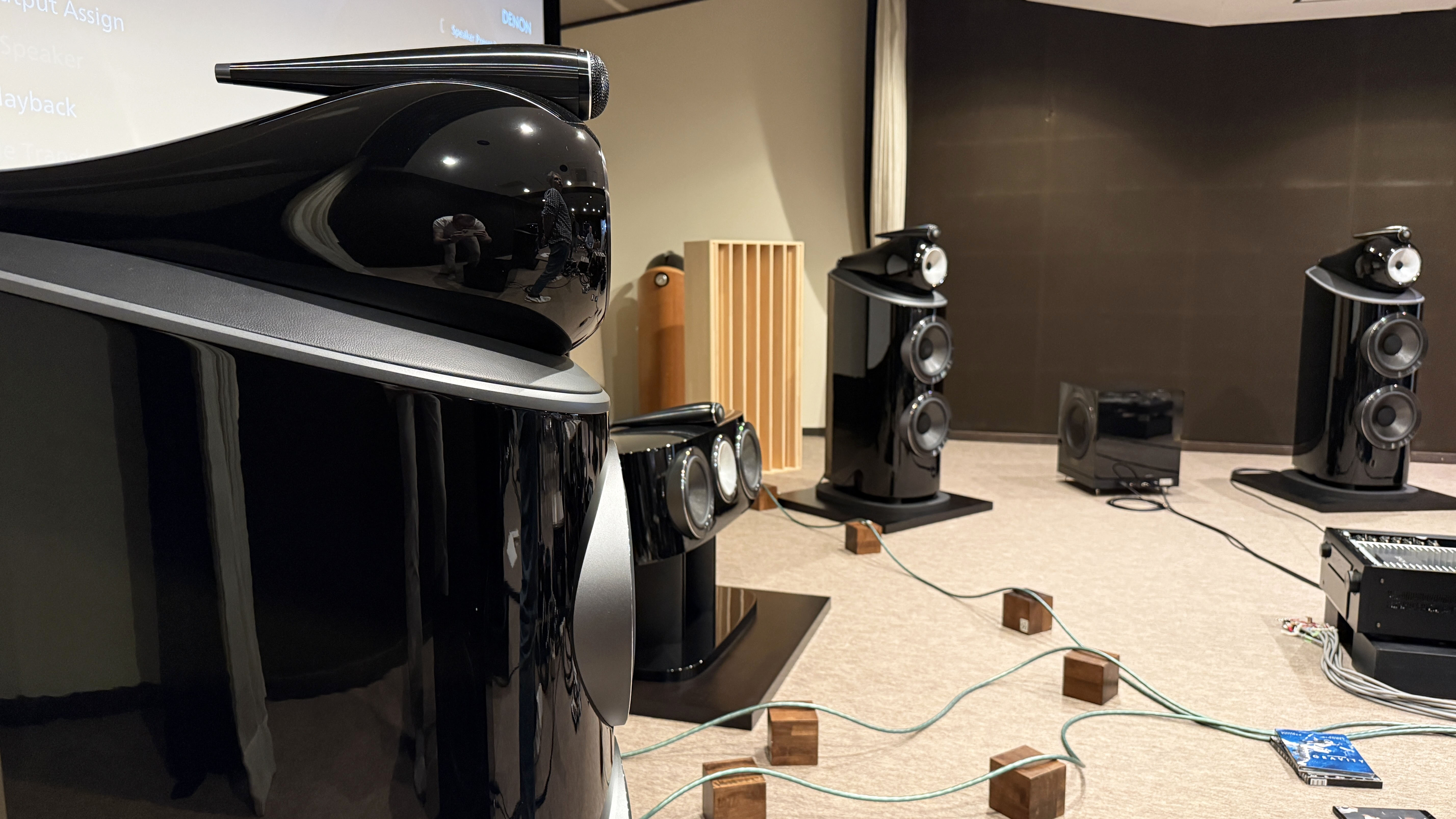 The interior of a home theater listening room with Bowers &amp; Wilkins 801 D4 speakers line-up