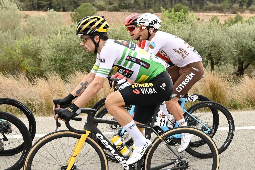 LO PORT SPAIN MARCH 24 LR Primoz Roglic of Slovenia and Team JumboVisma Green leader jersey and Nans Peters of France and Ag2R Citron Team compete during the 102nd Volta Ciclista a Catalunya 2023 Stage 5 a 1766km stage from Tortosa to Lo Port Mirador del Portell 1033m UCIWT on March 24 2023 in Lo Port Spain Photo by David RamosGetty Images