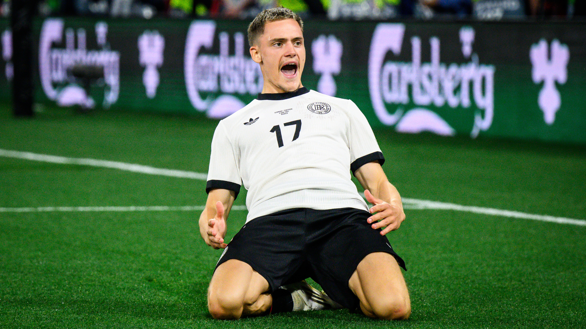 Florian Wirtz of Germany celebrates his team's first goal during the UEFA Nations League 2025 semifinal match between Germany and Portugal at Munich Football Arena on June 04, 2025 in Munich, Germany.