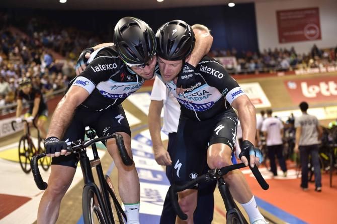 Mark Cavendish and Iljo Keisse embrace after they finish second overall